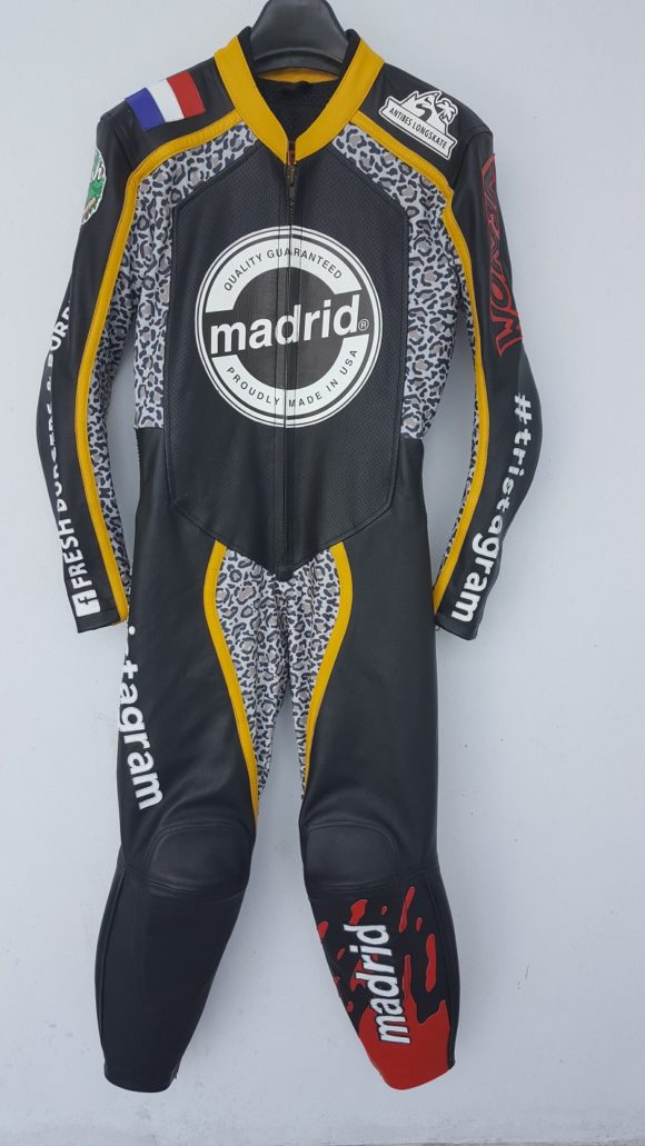 Black racing suit with the French flag on the shoulder right shoulder