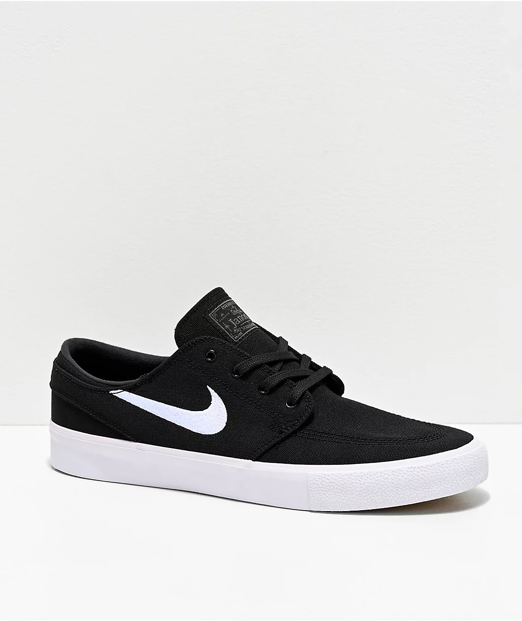 Black, Dark green and white colored skateboard shoes